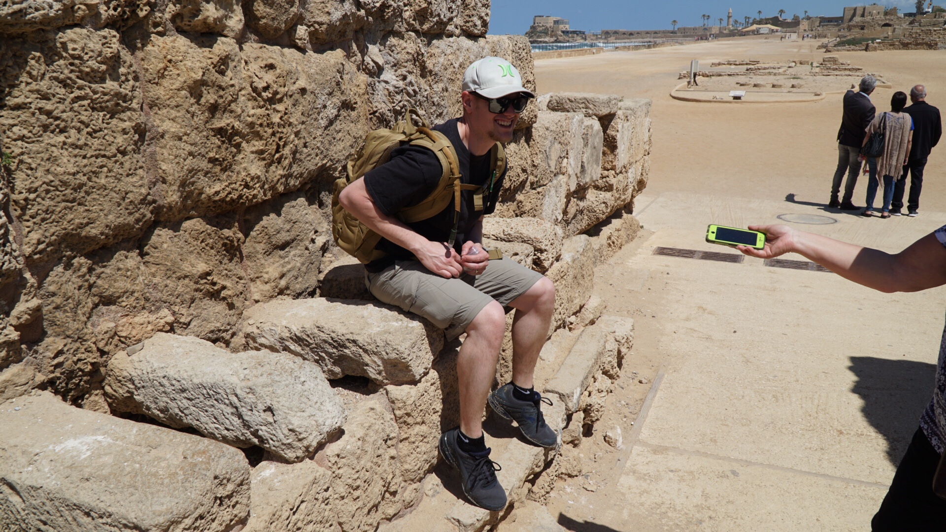Mark trying out the Ancient Toilets